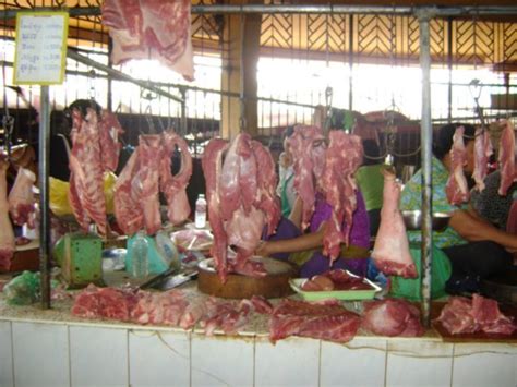 Hanging Meat At The Market Photo