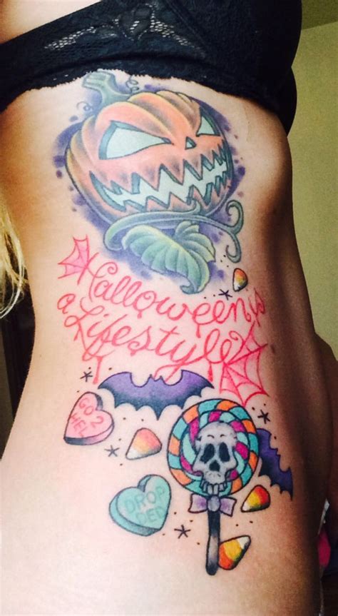 Halloween themed tattoo to make a tattoo for halloween is a very cool idea to highlight your personality. 50 Awesome and Creepy Halloween Tattoos -DesignBump