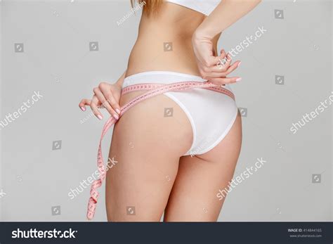 Slim Tanned Womans Body Over Gray Stock Photo Edit Now