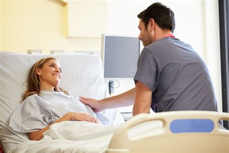 Male Nurse Talking With Female Patient In Hospital Room Stock Image Image 35799163