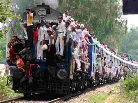 these photos of india s overcrowded railways will make you grateful for your commute