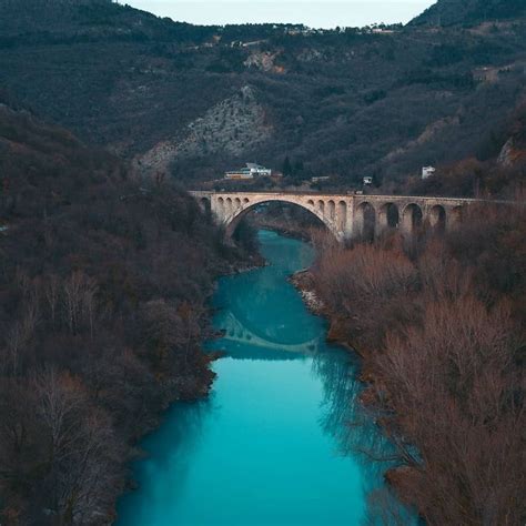 The Emerald Beauty Soča River Under The Stone Bridge In Solkan
