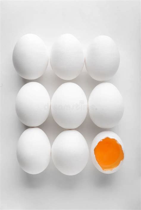 Cracked And Whole Chicken Eggs On White Background Stock Image Image
