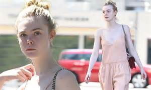 Elle Fanning In Pale Pastel Onesie While Shopping In Los Angeles