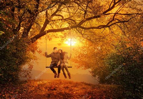 Romantic Couple Swing In The Autumn Park — Stock Photo © Geribody 38111301