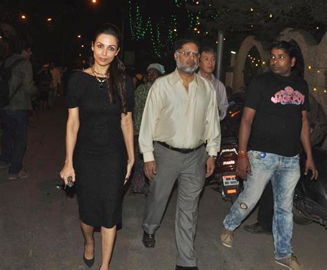 Malaika Arora Khan With Her Father At The Midnight Mass For Christmas