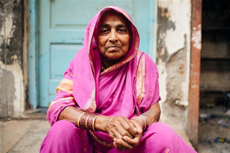 Aged Indian Female Posing By Her Door By Stocksy Contributor Yakov