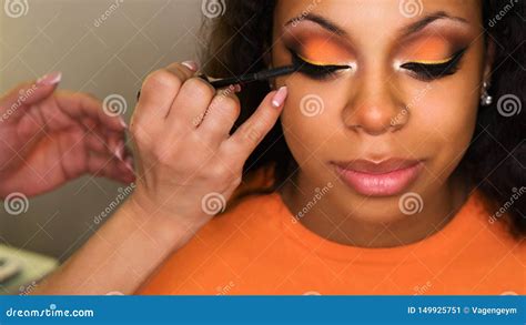 makeup artist applies makeup on face of girl stock image image of american fresh 149925751