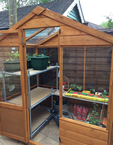 Diy greenhouse ideas to level up your gardening scheme. Greenhouse staging for any kind of space - Simplified Building