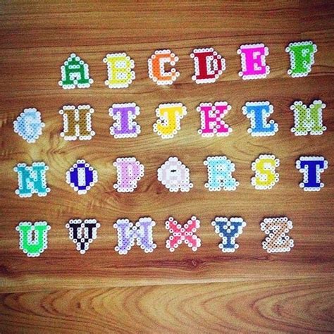 The Letters And Numbers Are Made Out Of Perler Beads