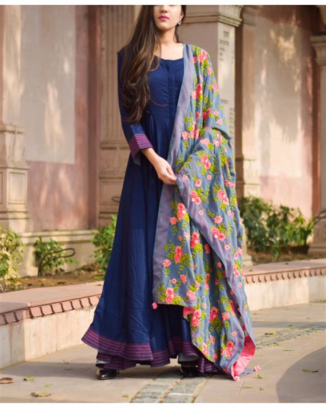 This georgette fabric has embroidery work all over the outfit. Navy blue anarkali dress with floral dupatta by Keva | The Secret Label