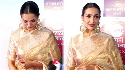 Malaika Arora Exudes Elegance In Golden Saree Bollywood