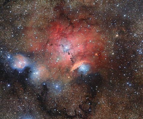 Colorful Cosmic Clouds Glow In Dazzling Image Of Stellar Nursery Space