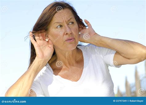 Mature Woman Is Listening Closely Stock Image Image Of Gesture