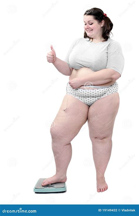 Happy Overweight Asian Woman Clenched Her Fists While Holding A Remote