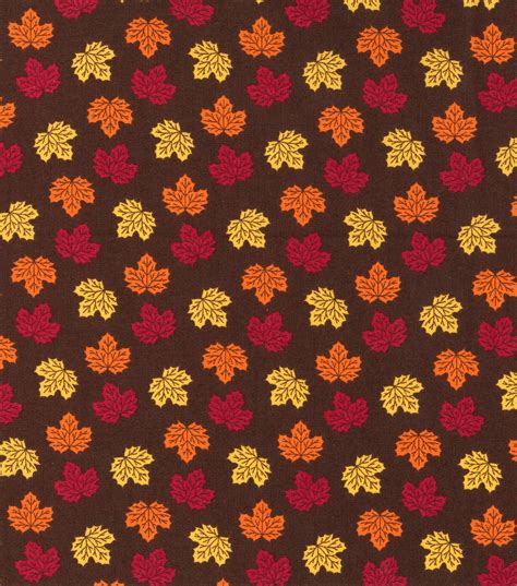 Harvest Cotton Fabric-Mini Tossed Leaves on Brown | JOANN