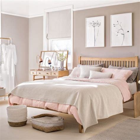 Although your bedroom color scheme is often a personal opinion, there are some paint colors that are more relaxing and better suited for your sleeping area. Pale pink bedroom with wooden furniture and woven ...