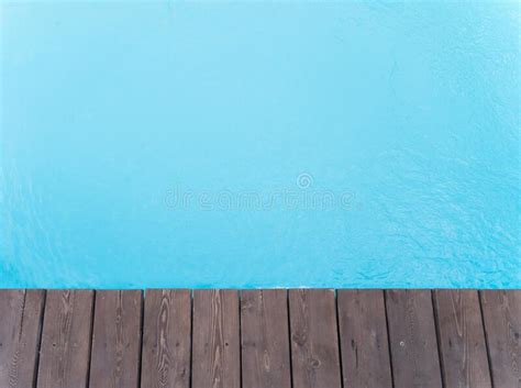 The Edge Of The Swimming Pool Wooden Floor At The Entrance To The