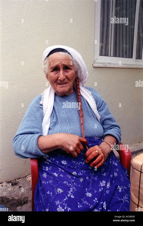 Portrait Of An Older Turkish Woman With Her Hands Coated With Henna In Celebration Of Ramadan