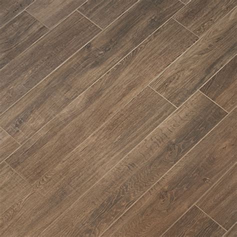 Porcelain wood look tile can also resemble reclaimed barn wood, complete with saw marks or weathered white paint. Tile look Like Wood Porcelain Tile | Dolce Wood-Look Porcelain | 6.5 x40