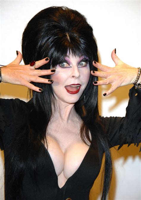 Spooky Spunky Elvira Celebrates 35 Years Of Business With A Coffin