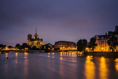 Book a hotel near la muette metro station. The swollen Seine river runs through Paris next to Notre ...