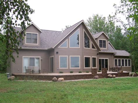 Custom Chalet Style Modular Home With Gorgeous Windows And Patio To