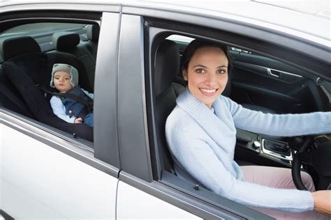 Mother Driving With Her Baby In The Car Seat In Her Car Quote Me