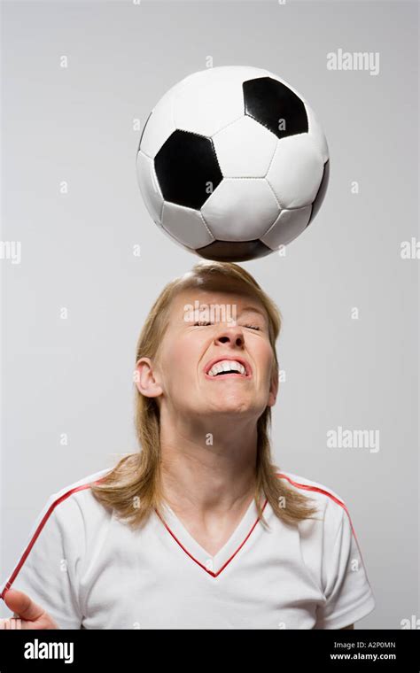 Footballer Heading Football Stock Photo Alamy
