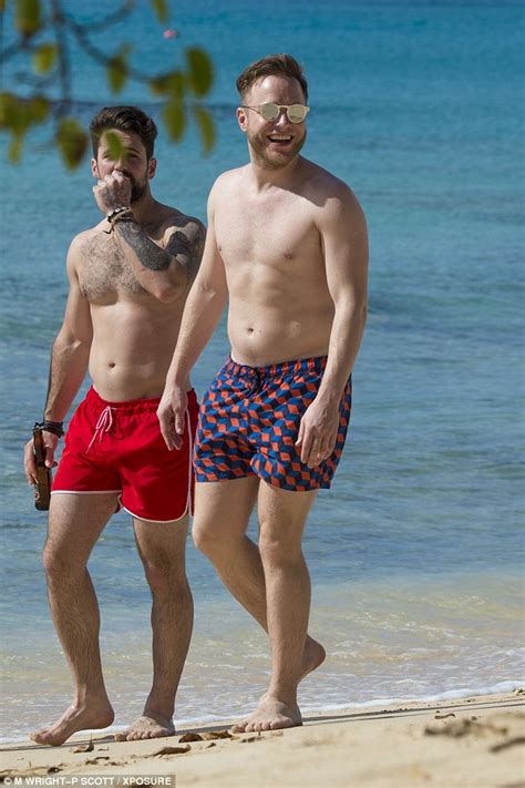 Shirtless Olly Murs Shows Off His Abs As He Hits The Beach In Barbados
