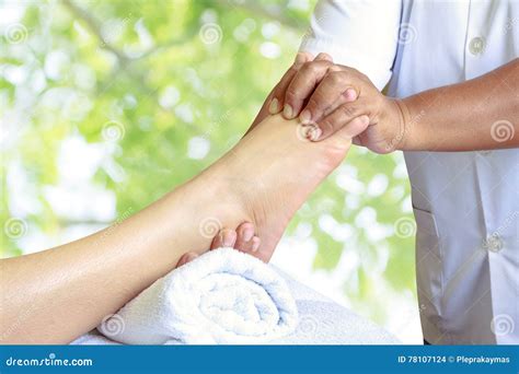 Thai Foot Massage Relaxing Treatment Stimulation Of Active Points Of Feet Royalty Free Stock