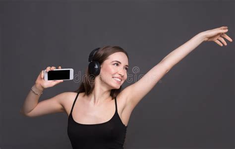 Woman Listen To Music In Earphones Studio Shot Stock Image Image Of