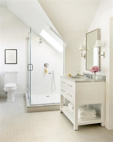 The best answer would be to start with the place that looks the worst and catches this reflects light and will show more space. Bathroom Sloped Ceiling Design Ideas