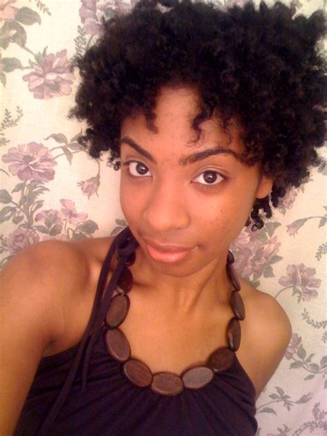 This picture is a great example of a two strand twist out hairstyle. Two-Strand Twists and Twist-Out With CURLS Products | Two strand twist hairstyles, Short natural ...
