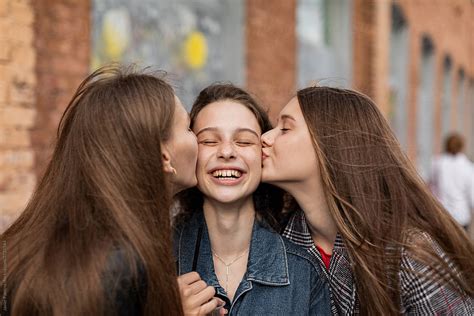 Teenagers Friends Hangout On The Street By Stocksy Contributor Javier Pardina Stocksy