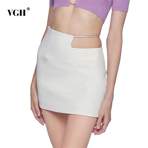 Vgh White Hollow Out Bodycon Skirt For Women High Waist Patchwork Chain A Line Mini Skirts