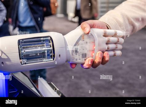 Human Hand And Robots As A Symbol Of Connection Between People And