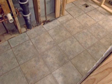 Before we can get to laying any tile in our bathroom or kitchen, you need to make sure all of the previous flooring is removed. How to Install a Tile Bathroom Floor | how-tos | DIY