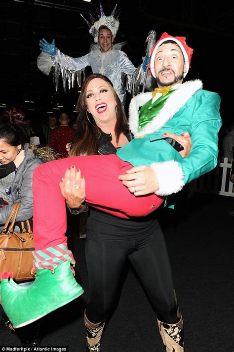 Lisa Appleton Scoops Up Grown Man In Elf Suit At Winter Wonderland Manchester Daily Mail Online