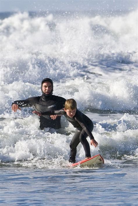 Surfing Surfing Father And Son Surf Lesson