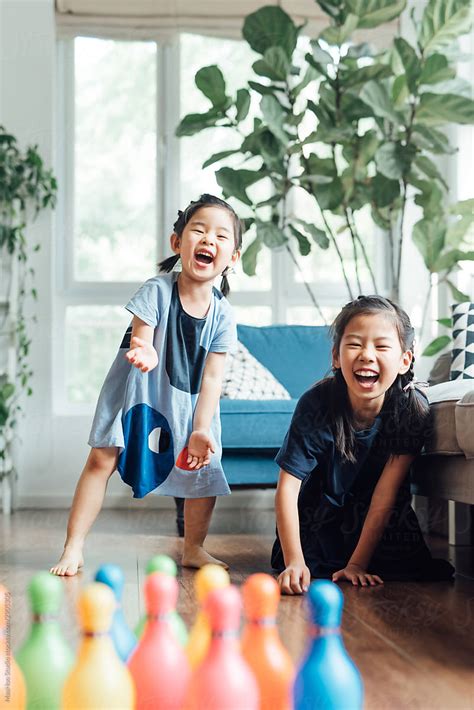 Cute Girls Playing At Home By Stocksy Contributor Maahoo Stocksy