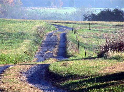 .at is the cctld (country code top level domain) for austria. Country lane royalty free stock photograph
