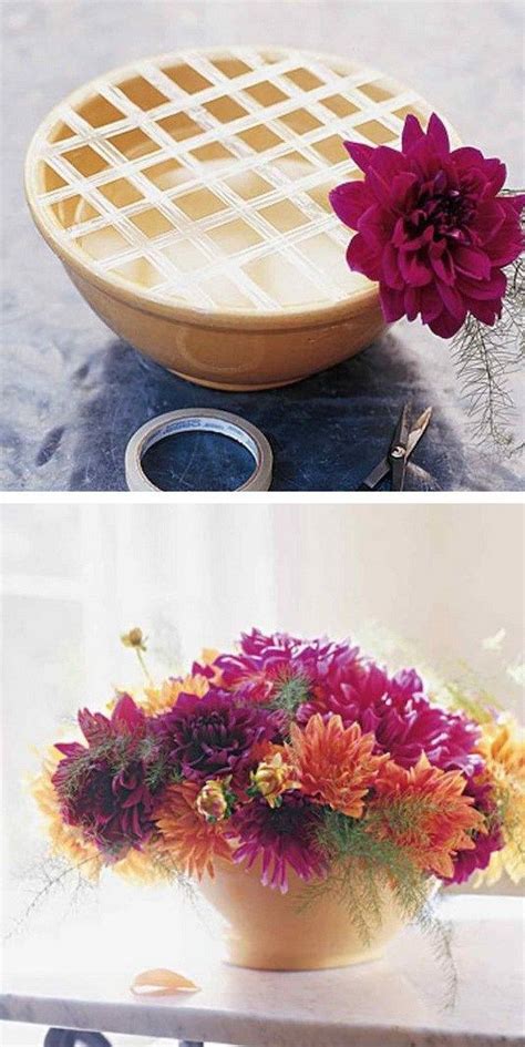 flower arrangement in wide month vase or bowl with cellophane tape use cellophane tape or any