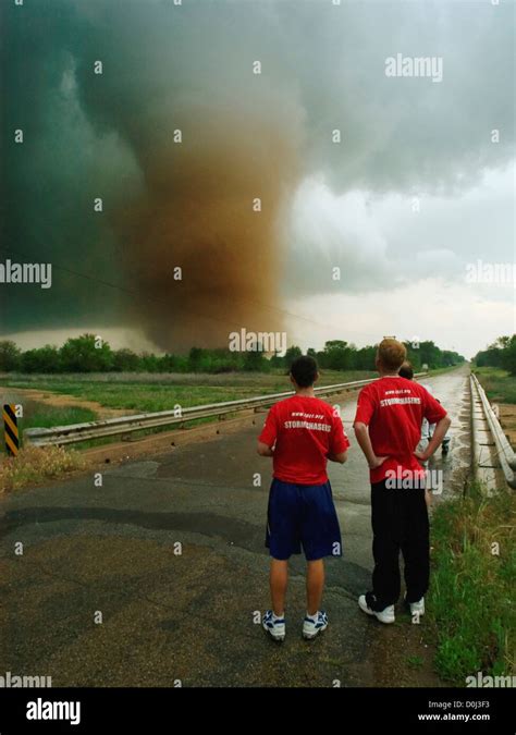 Storm Chasers Watch A Large Tornado Stock Photo Alamy