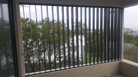 Privacy Screen With Adjustable 160mm Vertical Louvers Blades In A Fixed