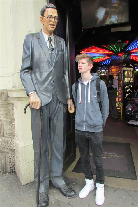 To convert cm to feet and inches, first divide the cm value by 30.48 to convert into feet. Me (14) stood next to 8'11 Robert Wadlow. Also the guy in ...