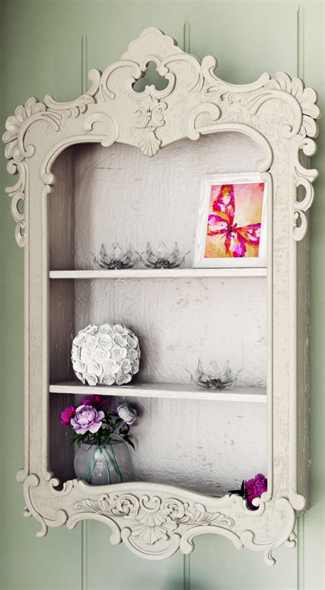 A White Shelf With Flowers And Pictures On It