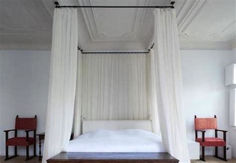 Canopy bed drapes provide a focal point for a room. 20 Of The Most Beautiful Canopy Bed Curtains - Housely
