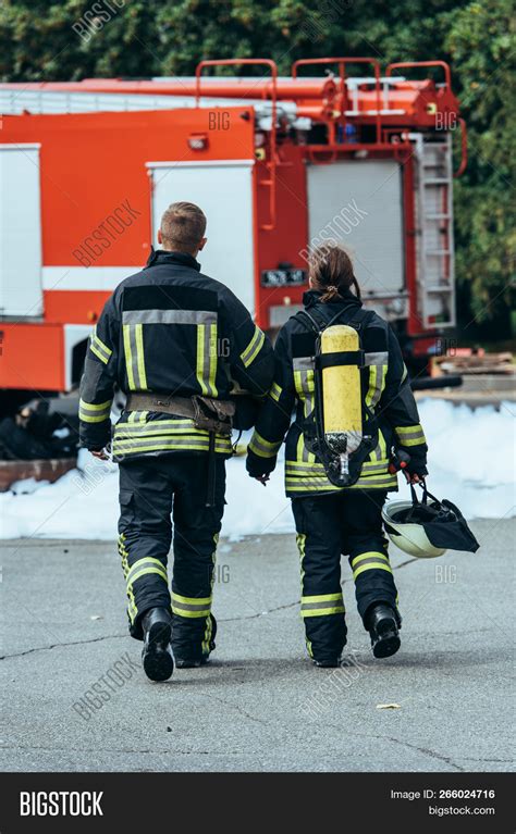 Back View Firefighters Image And Photo Free Trial Bigstock