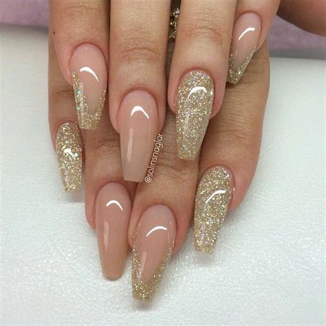 Nude Light Tan Color And Gold Glitter Polish With Gel Polished Nails